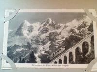 CH_Place_1900-1949_Murrenbahn mit Eiger, Moench und Jungfrau.jpg